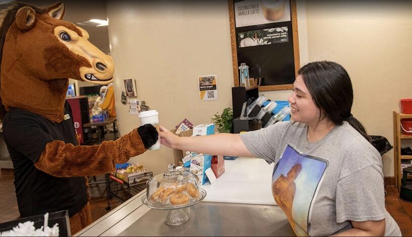 Fierce and Java Jitter employee with Coffee