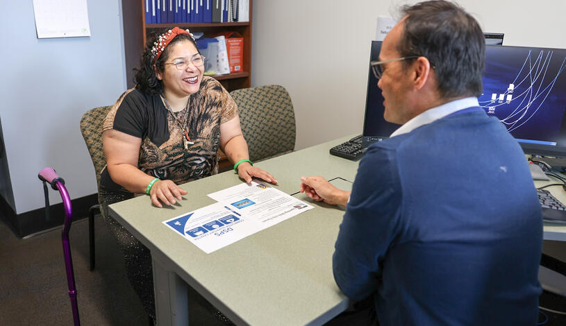 A student gets assistance from a DSPS faculty member
