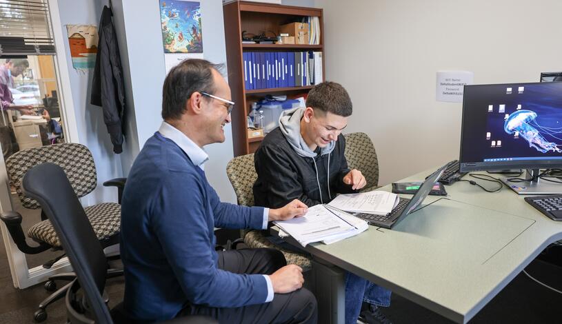 A student gets help from a DSPS faculty member