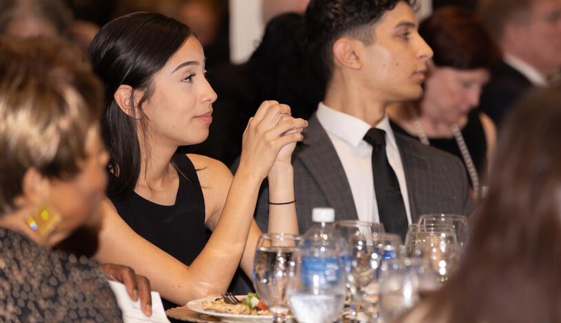A student enjoys dinner at the Delta College Foundation Gala