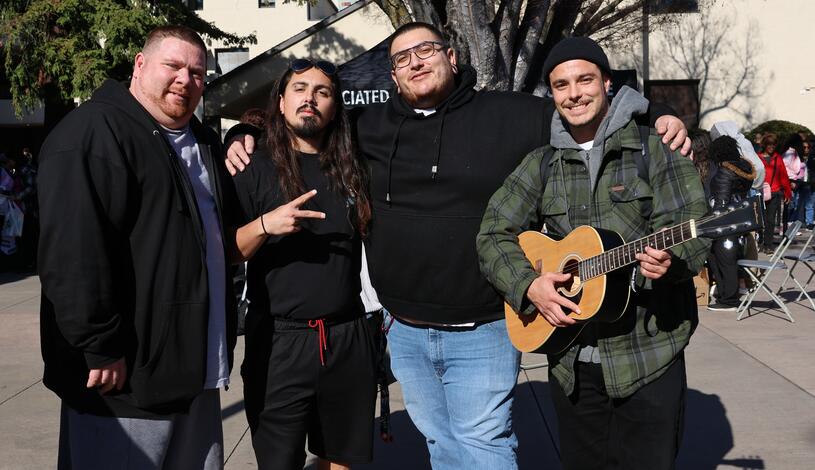Students hanging out in the Quad during the first week of the semester