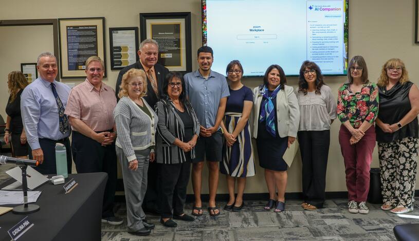Photo of Board members and College employees at a recent Board meeting