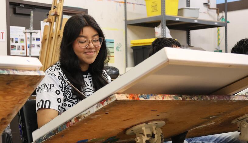 Photo of a student in painting class