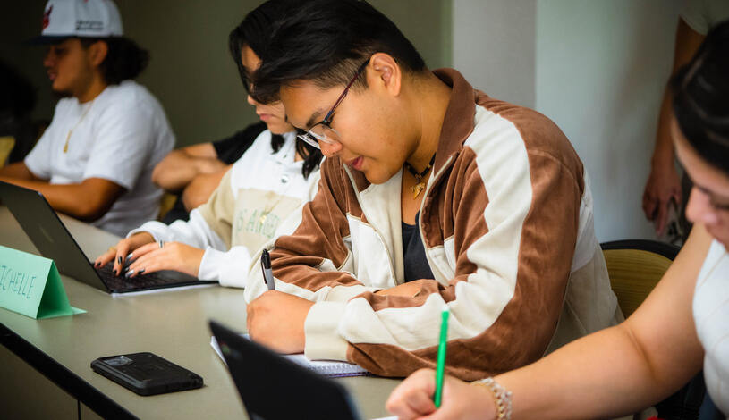 A student concentrates during a political science lecture