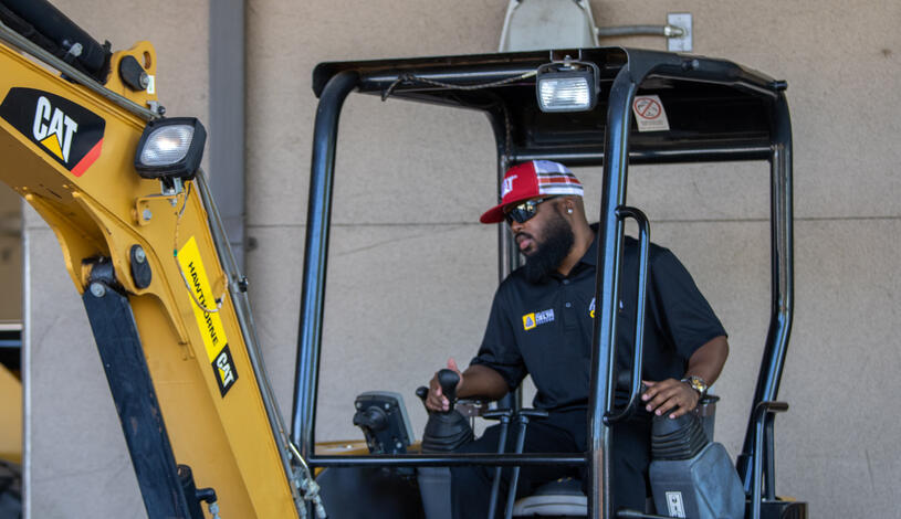 Student training on a CAT tractor