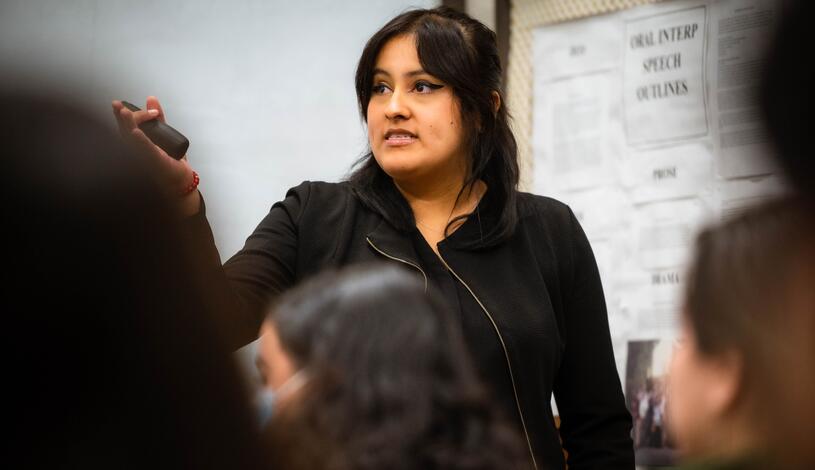 Photo of a student delivering a speech during their class