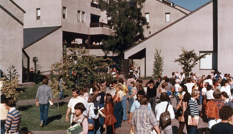 Students walking across campus around 1977