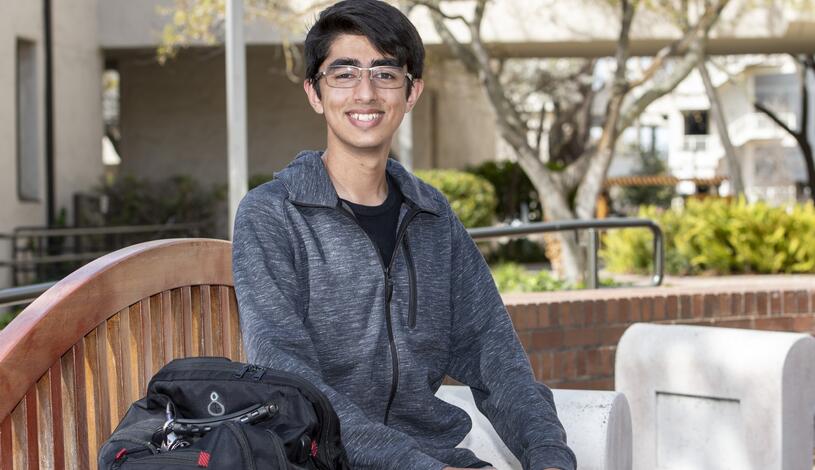Photo of a young student smiling at Delta College 