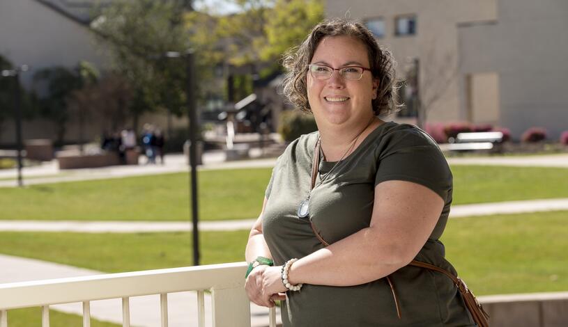 Photo of a student overlooking the Dolores Huerta Plaza