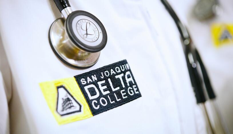 Close-up photo of a nursing student's uniform