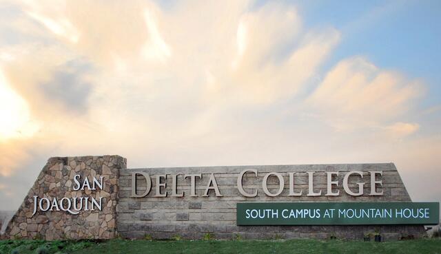 Delta College's Mountain House Campus entrance sign in front of clouds and sky