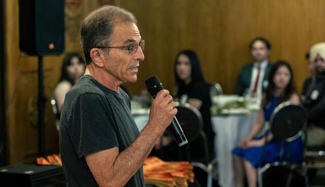 Professor Joel Blank gives a speech