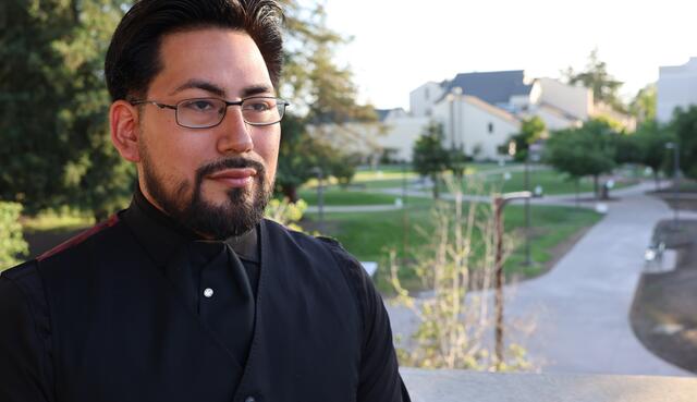 A Pathway to Law student poses for a portrait