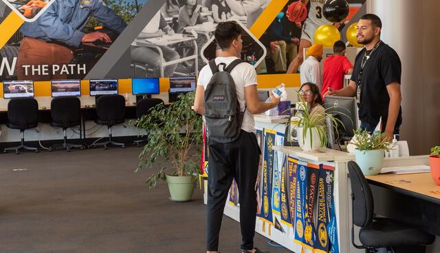 A student gets help at the Delta Connect Center
