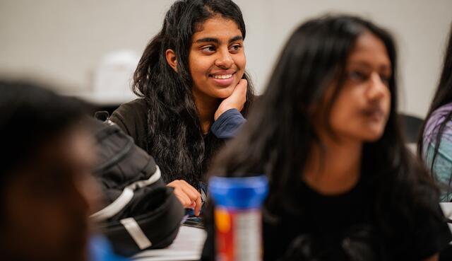 Photo of a student smiling during her dual enrollment course at Mountain House