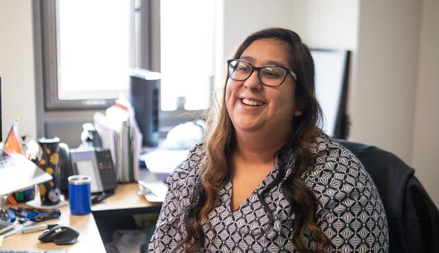 A Delta College counselor smiles while meeting with a student