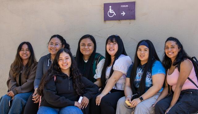 Photo of a group of friends hanging out between classes
