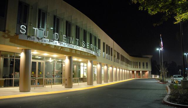 Photo of DeRicco Building at night