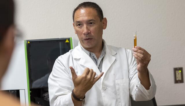 Photo of a chemistry professor in the lab