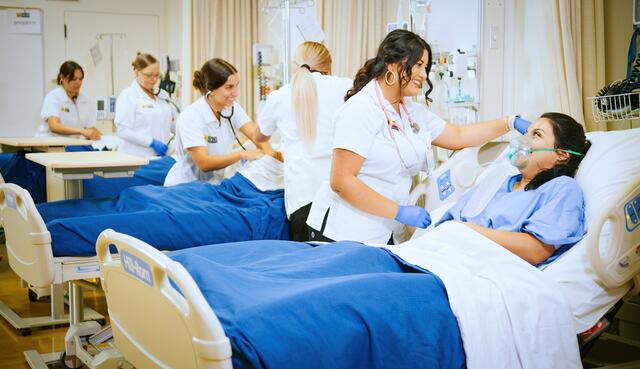 Photo of nursing students in the lab