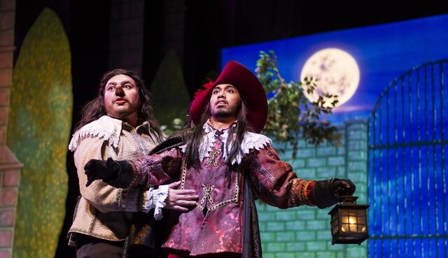 Photo of two actors performing a play at Delta College