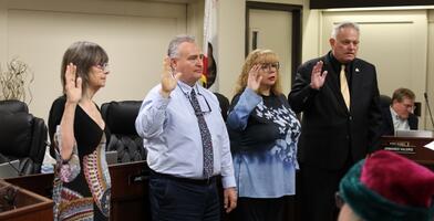 Photo of Delta College trustees being sworn in