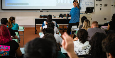 Photo of Professor Cirian Villavicencio lecturing