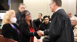 Trustees Catherine Mathis and Janet Rivera take the oath