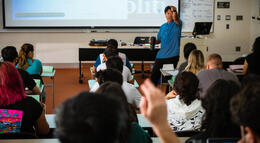 Photo of Professor Cirian Villavicencio lecturing