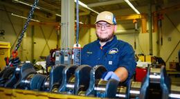 Photo of a Caterillar student working with heavy equipment