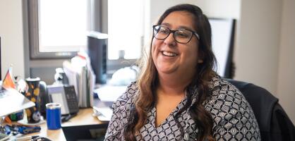 A Delta College counselor smiles while meeting with a student