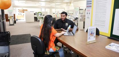 A student gets assistance at the CTE Workforce Development office.