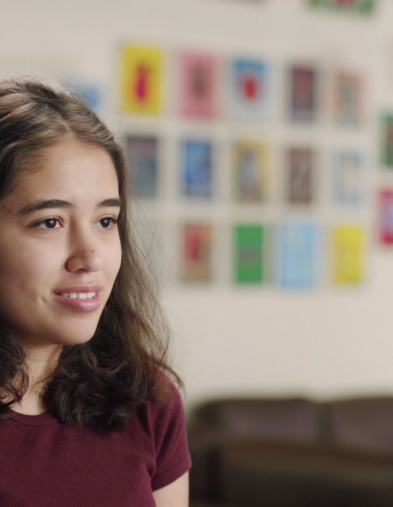 Puente student smiling and looking in the distance