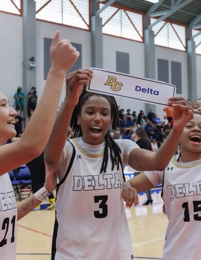 Players celebrate after winning the state championship
