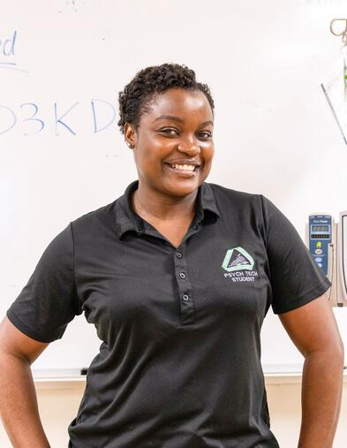 Delta College Psychiatric Technician student smiling in a classroom